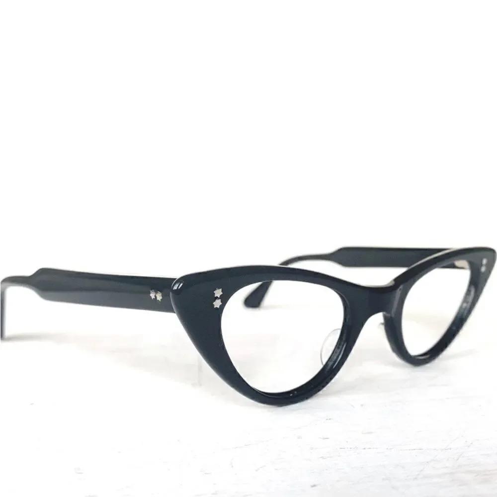 Vintage cat frame glasses by France Swank. Mint condition.